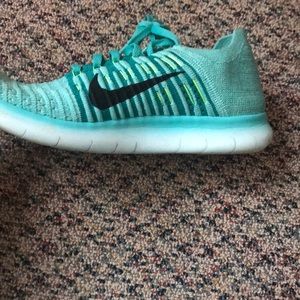 Women’s turquoise/aqua Nike Free Run Running shoes